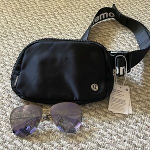 NEW Lululemon Belt bag/ waist bag 1L size in Black and branded strap